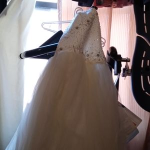 A wedding dress, veil